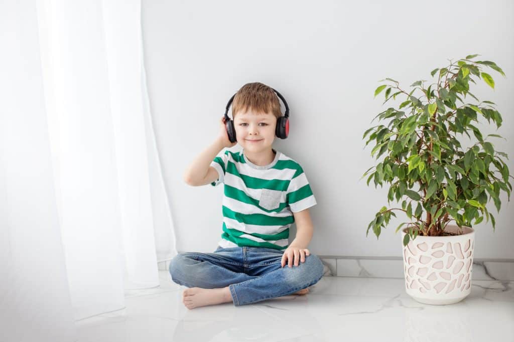 Boy listening to headphones